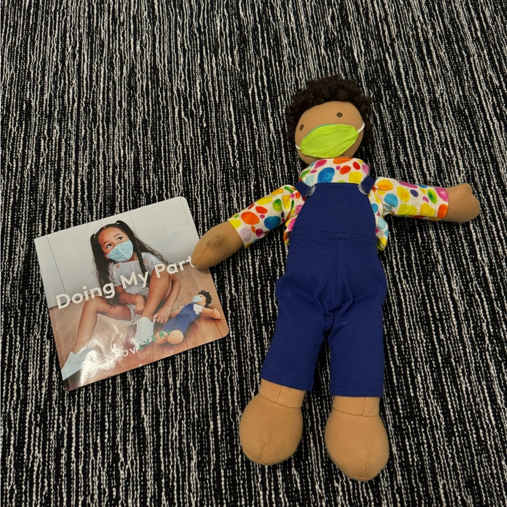 Lovevery Quinn doll and book